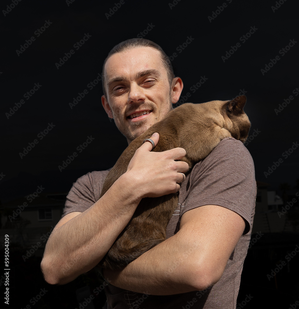 man with a cat