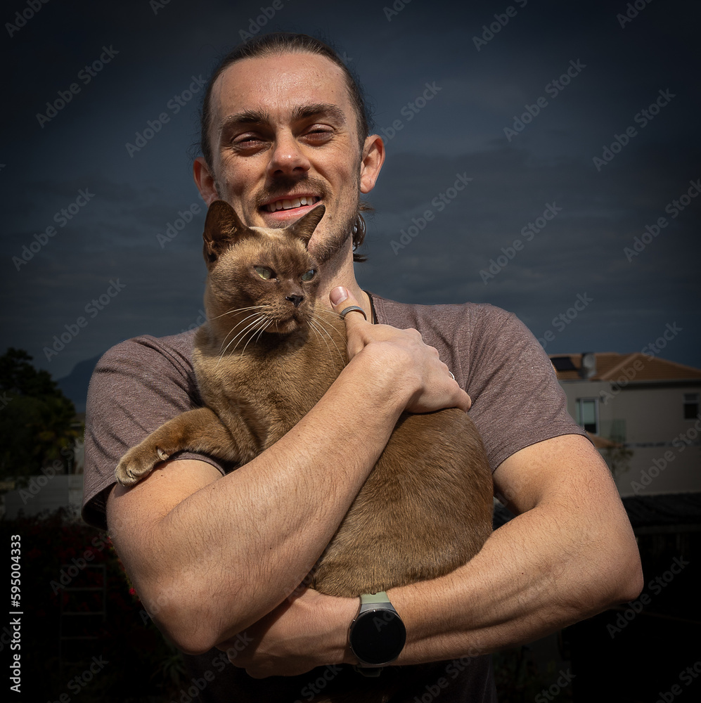 portrait of a man with a cat