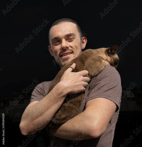 Obraz na płótnie man with a cat w salonie
