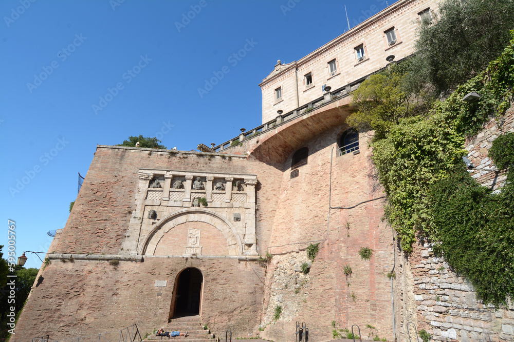 the Marzia gate which is one of the ancient gates of the Etruscan walls of the city of Perugia and is located near the Lomellina fountain.