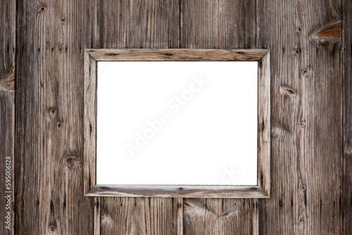 A rustic dark brown wooden facade with a wooden frame as a window.