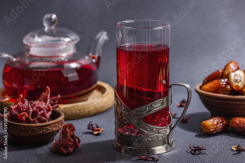 Hibiscus hot tea with dates. Traditional Ramadan Kareem concept snack for Iftar or Suhoor meal