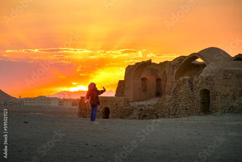 Yazd, Iran - May 2022: Ruins of Zoroastrians Dakhmeh Towers of Silence in Yazd city photo