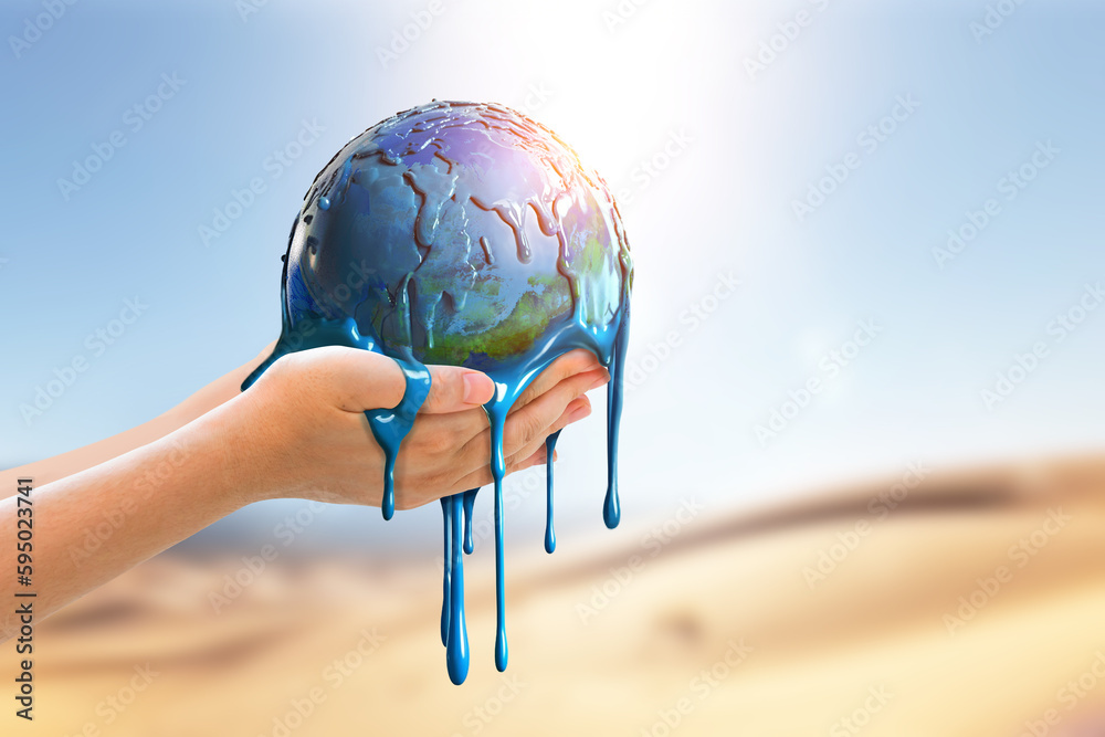 two hands holding the blue earth globe floats off the ground and