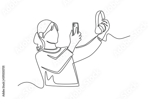 Single one line drawing happy girl share photo of her favorite item with smartphone. Social media concept. Continuous line draw design graphic vector illustration.