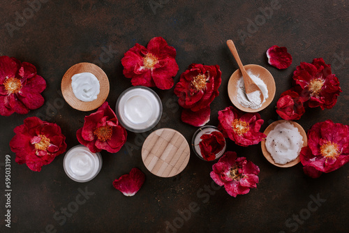 Fototapeta Naklejka Na Ścianę i Meble -  skincare products and dog rose flowers. natural cosmetics for home spa treatment