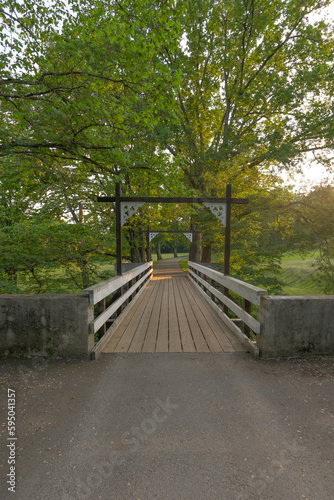 Wooden bridge over a stream in Toila Oru Park, Estonia.