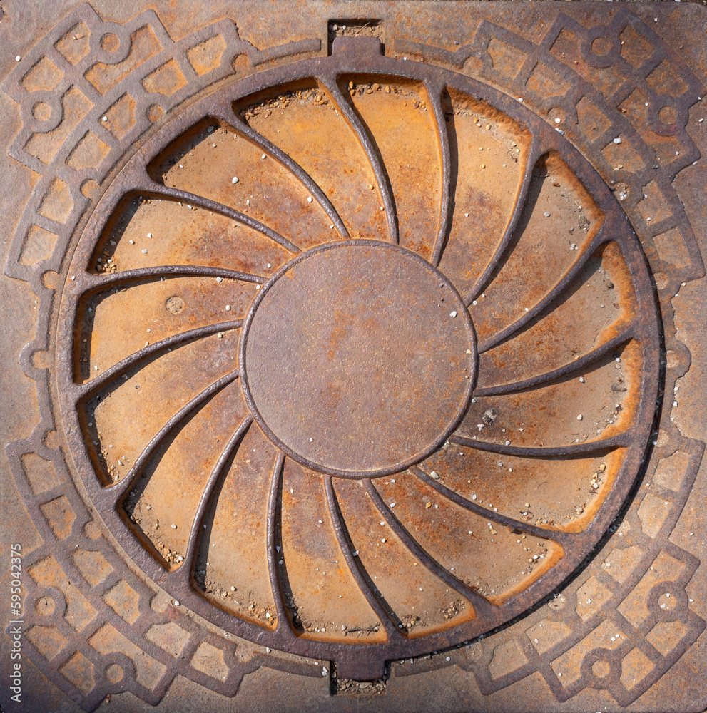 Manhole cover. Metal plate in the city