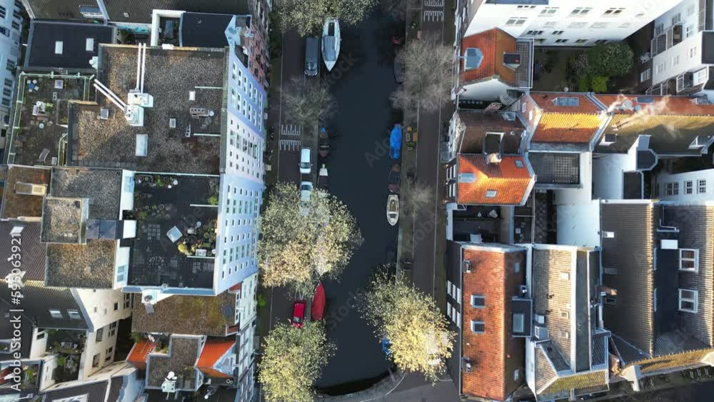Top-down aerial view of a canal in Amsterdam, Netherlands