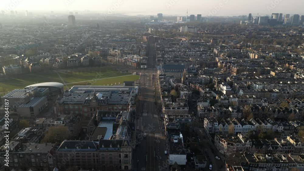 Sunrise flight over the streets of Amsterdam, Netherlands Sunrise flight over the streets of Amsterdam, Netherlands
