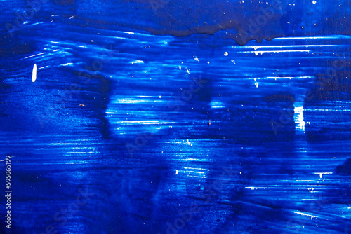 abstract blue background. paint streaks. blue metal. blue color texture.