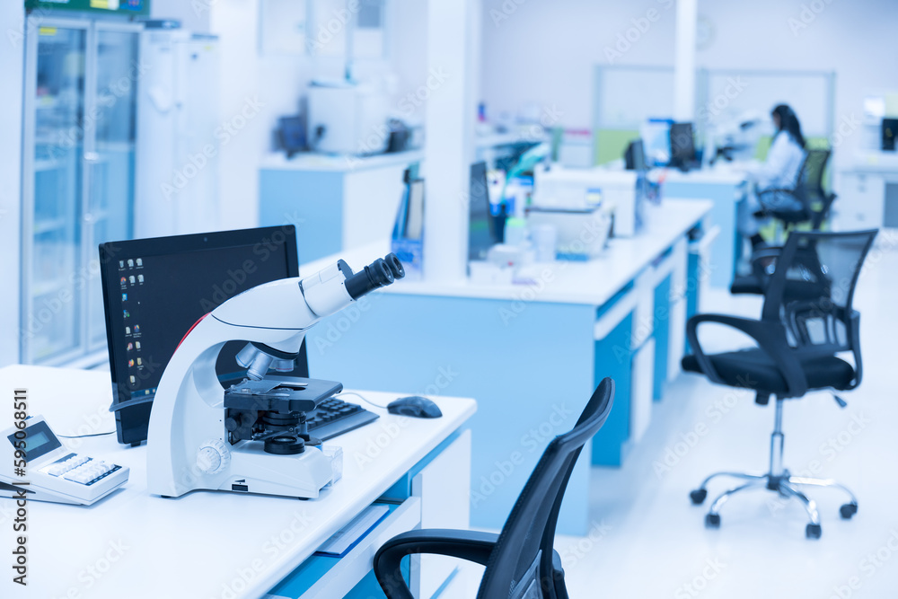 Selective focus microscope in laboratory unit.Modern medical research laboratory with microscopy on the desk.Health scientific lab biotechnology department center.Medical healthcare technology concept Selective focus microscope in laboratory unit.Modern medical research laboratory with microscopy on the desk.Health scientific lab biotechnology department center.Medical healthcare technology concept
