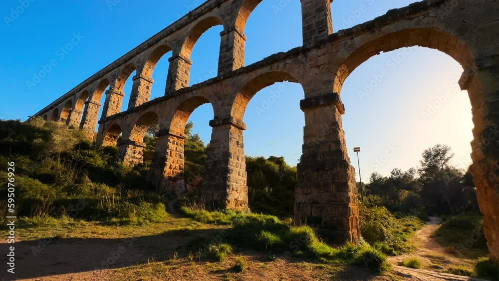 Roman aqueduct Devils Bridge at Sunset. Tarragona, Catalonia, Spain. High quality 4k footage Roman aqueduct Devils Bridge at Sunset. Tarragona, Catalonia, Spain. High quality 4k footage