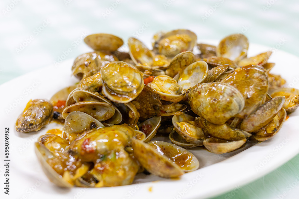 Fototapeta premium Chinese dishes stir fry clam with the sauce