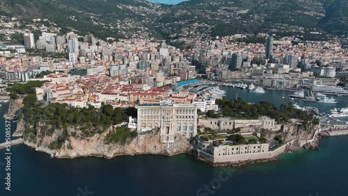 Aerial view of The Oceanographic Museum in Monaco Ville, South France ft. Prince Palace on the rock in Mediterranean Sea and Old Town around the famous port and marina from above of Monte Carlo 4K UHD photo