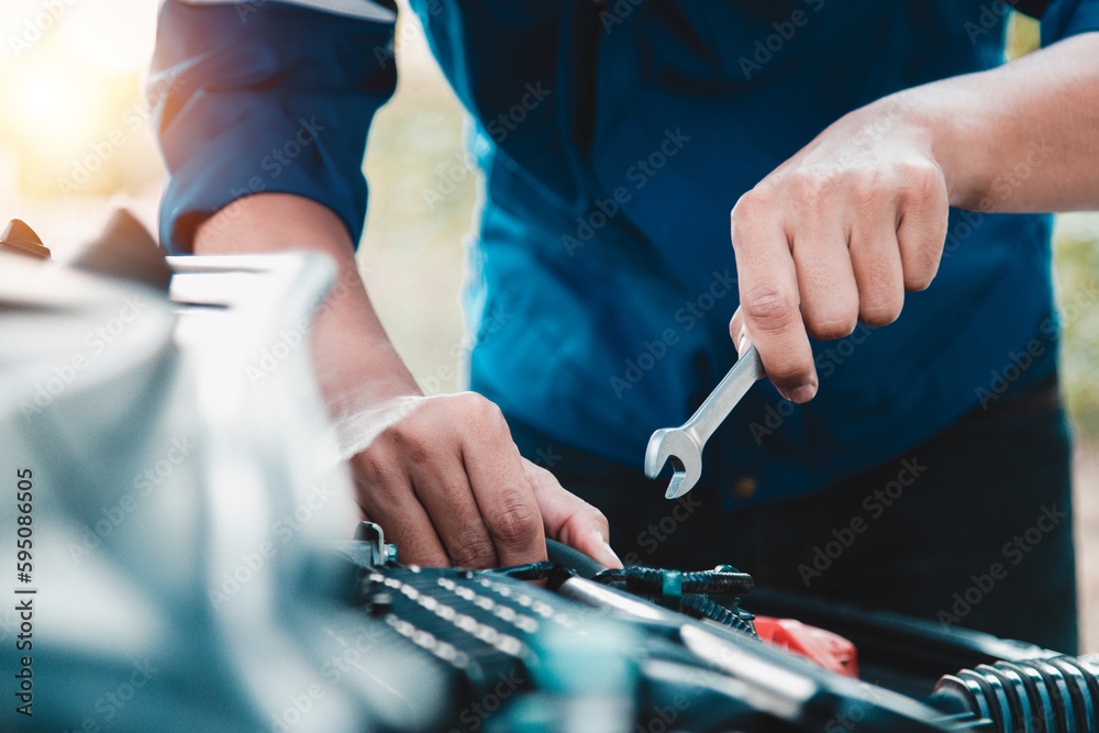 Mechanic open vehicle hood checking up auto mobile, fixing a car at home,Repair and service