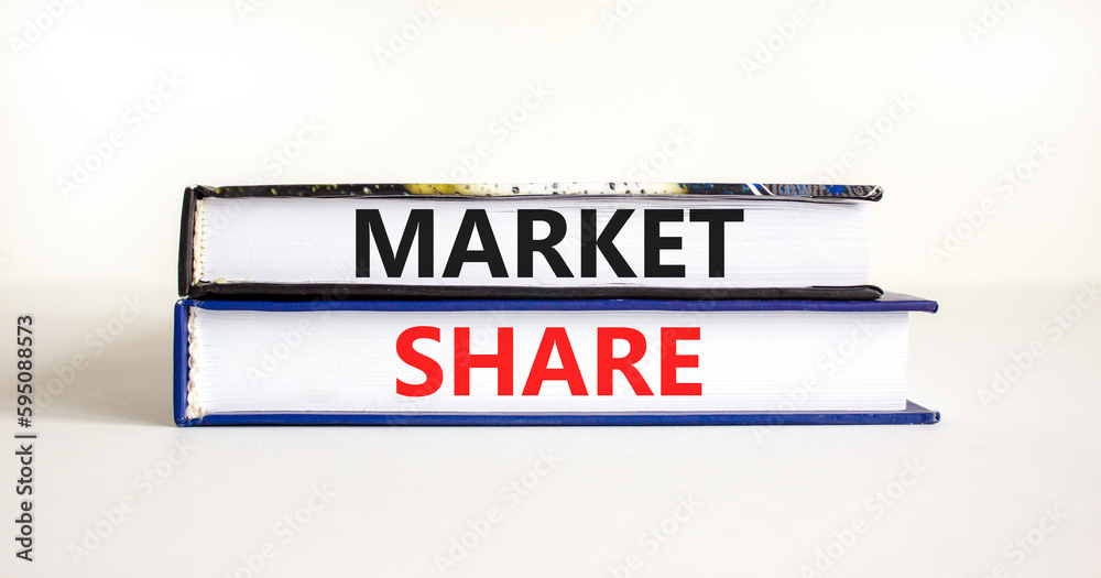 Market share symbol. Concept words Market share on beautiful books. Beautiful white table white background. Business and Market share concept. Copy space.