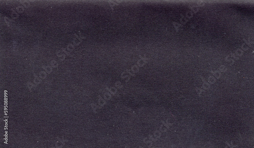 Sheet of black textured paper with noise and dust texture