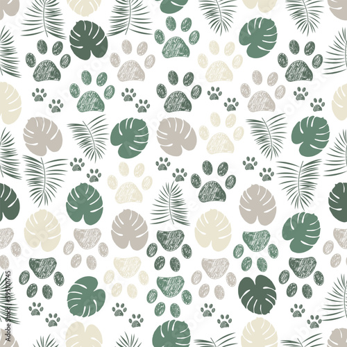 Green tropical leaf and doodle paw prints
