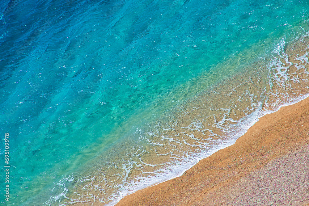 Beautiful crystal clear pure sea water with send. Summer beach footage background
