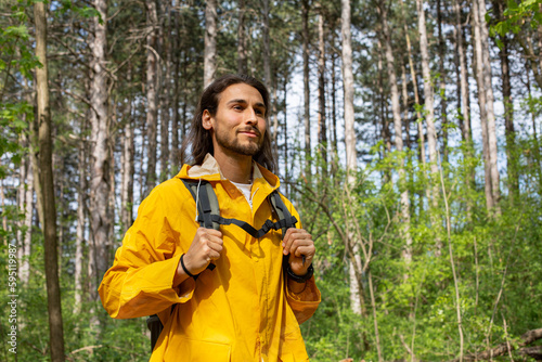 Man walking in forest photo