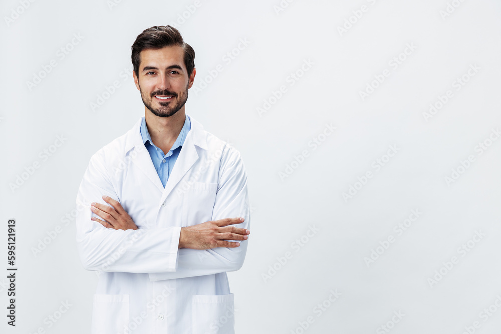 Man doctor in white coat looking into camera on white isolated background, copy space, space for text, health Man doctor in white coat looking into camera on white isolated background, copy space, space for text, health