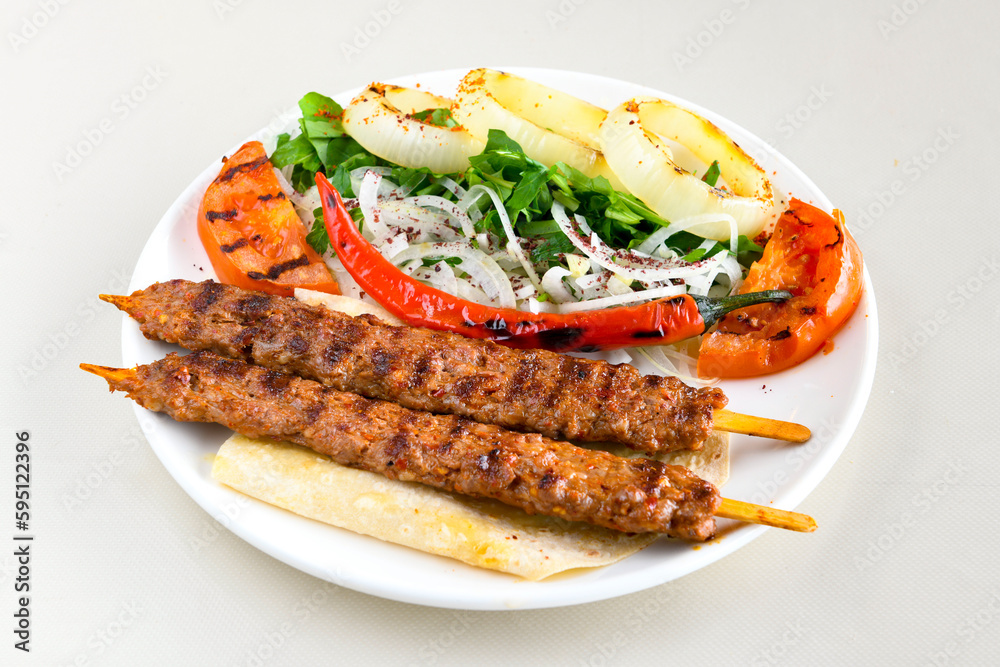 Beef steak grill with rice pilaf, fried potatoes, grilled pepper and tomatoes.Mix Platter with Beef rips, Cutlets, Potatoes and Sauces. Beef steak grill with rice pilaf, fried potatoes, grilled pepper and tomatoes.Mix Platter with Beef rips, Cutlets, Potatoes and Sauces.