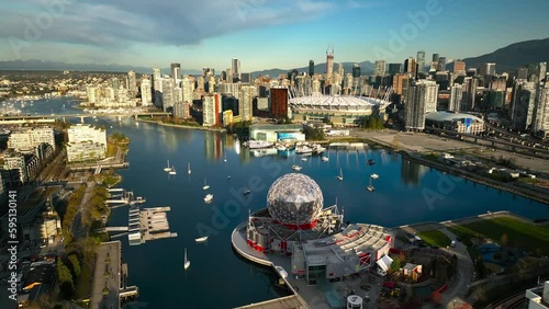 Vancouver city centre at false creek with B.C. Place and Science World with skyline and skyscrapers in background photo