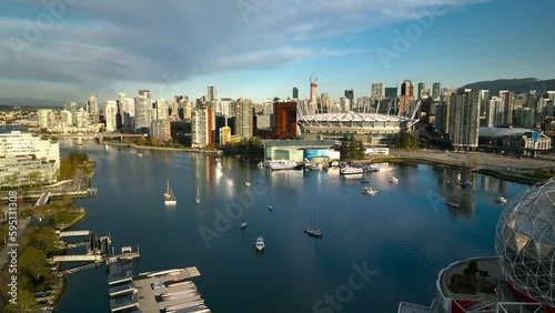 Vancouver city centre at false creek with B.C. Place and Science World with skyline and skyscrapers in background photo