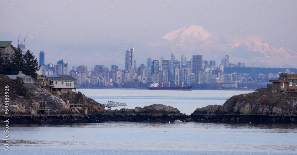 Cabins on Passage Island with Downtown City Buildings and Mnt Baker in Background. Vancouver, British Columbia, Canada.