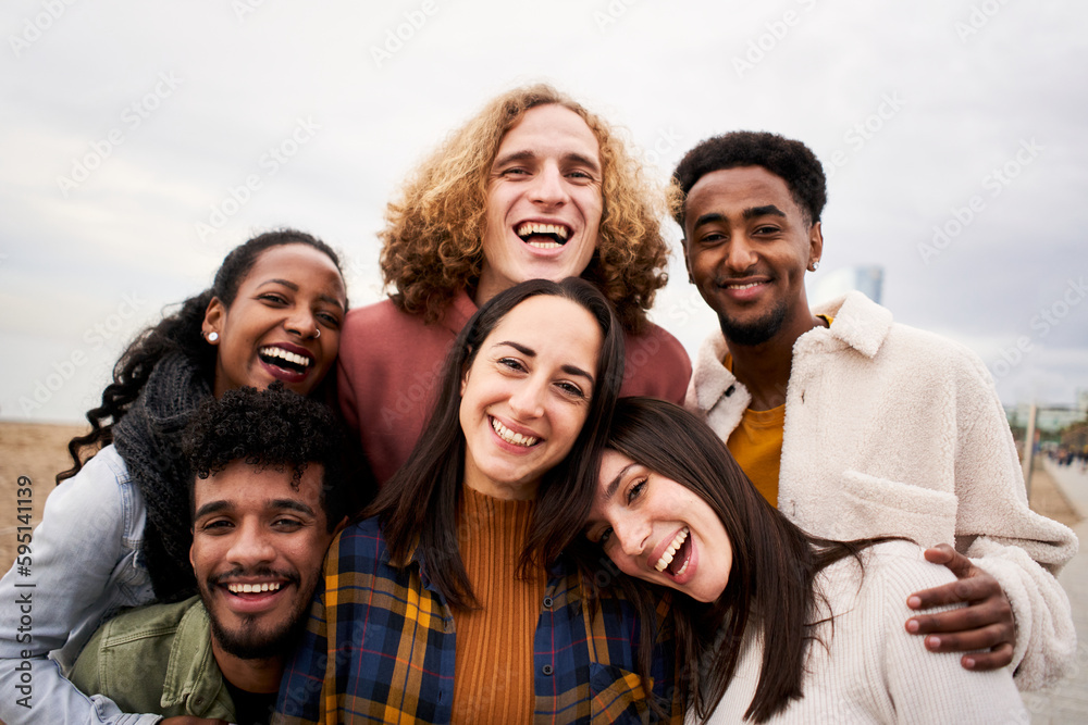 Happy friends from diverse cultures and races taking selfie outdoors. Cheerful people having fun. High quality photo Happy friends from diverse cultures and races taking selfie outdoors. Cheerful people having fun. High quality photo