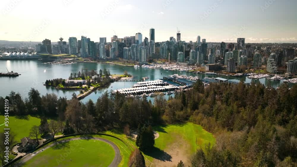Aerial view of the city of Vancouver from Stanley Park in mid day sun skyline and skyscrapers Aerial view of the city of Vancouver from Stanley Park in mid day sun skyline and skyscrapers