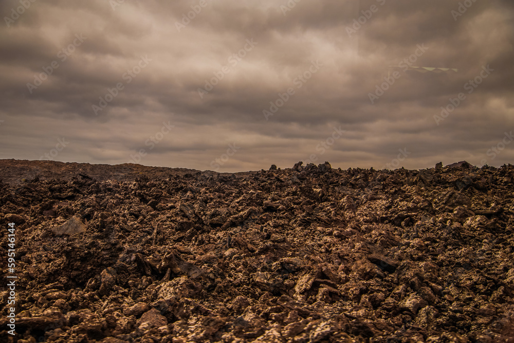 Obraz premium Amazing panoramic landscape of volcano in Timanfaya national park. Popular touristic in Lanzarote island Canary islans Spain. Artistic picture. Travel concept