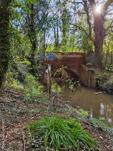 bridge over the river loated in Coventry near the canals reservoir photo