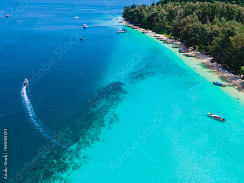 Koh Kradan Island with a white tropical beach and turqouse colored ocean © Chirapriya