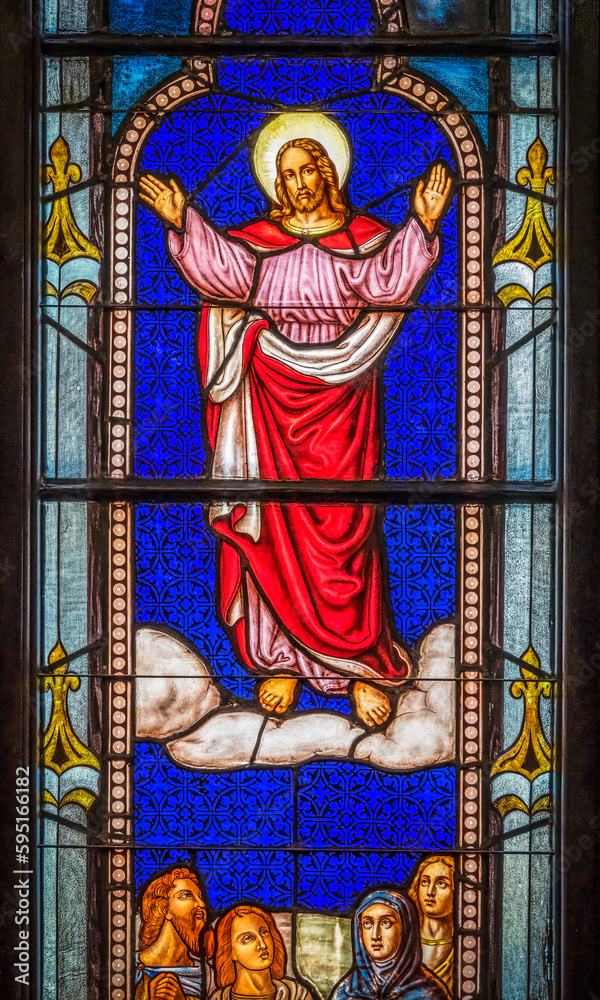 Jesus Christ ascending to heaven stained glass, Trinity Parish Church, Saint Augustine, Florida. Founded in the 1700's. Stained glass from mid-1800's