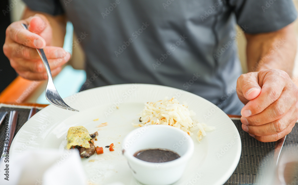 Symbolic image of human hands enjoying a scrumptious breakfast dessert of bread and berries, representing the simple pleasures of life and the importance of savoring every moment Symbolic image of human hands enjoying a scrumptious breakfast dessert of bread and berries, representing the simple pleasures of life and the importance of savoring every moment