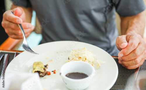 Symbolic image of human hands enjoying a scrumptious breakfast dessert of bread and berries  representing the simple pleasures of life and the importance of savoring every moment