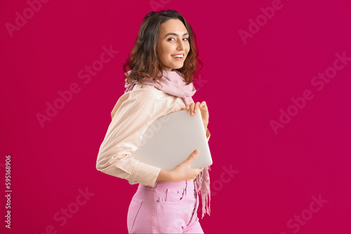 Stylish young woman in scar...