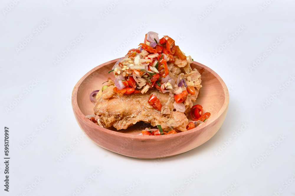 fried chicken and chilli sauce in wooden bowl on white background fried chicken and chilli sauce in wooden bowl on white background