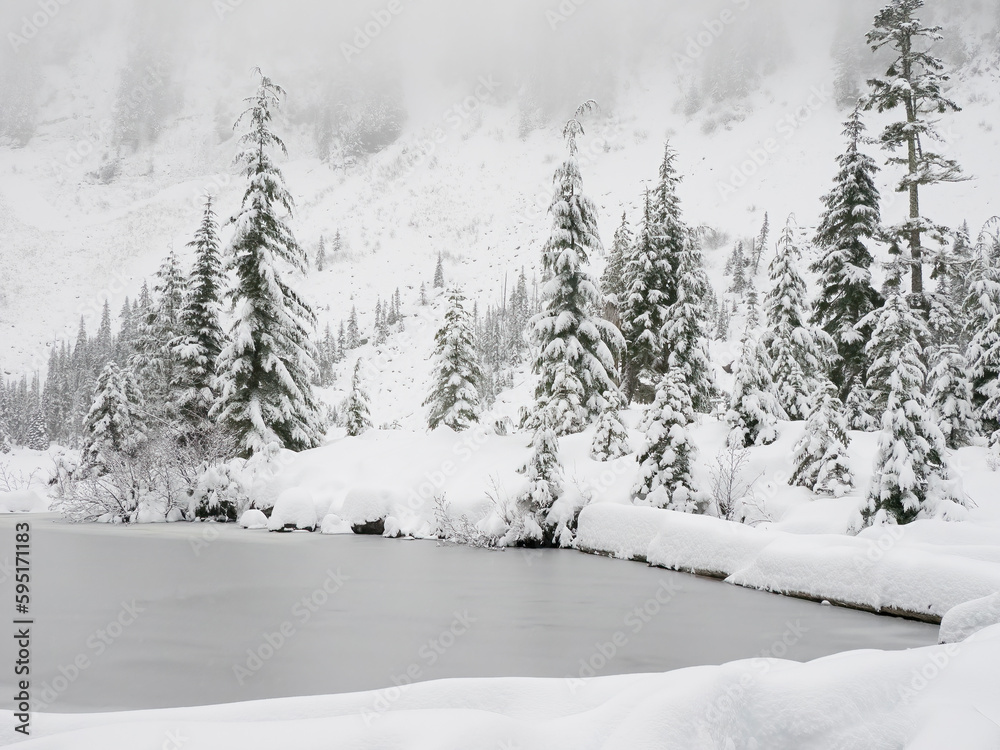 Washington State, Central Cascades. Winter scene at frozen Granite Lake