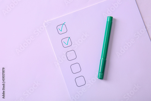Checklist box with green ma...