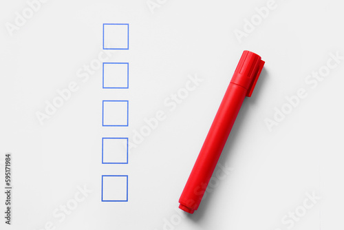Checklist box with red mark...