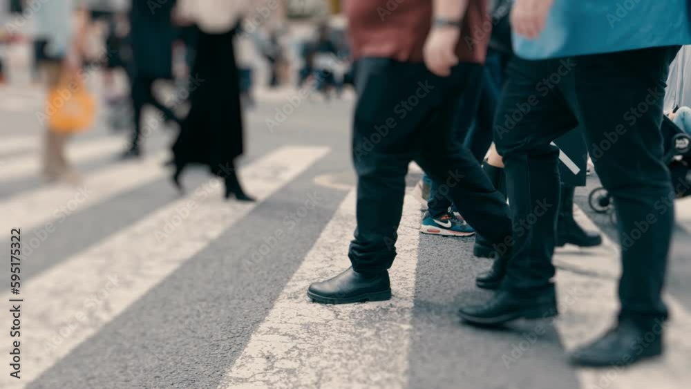 Many pedestrians crossing on the road, Shibuya in Tokyo in Japan, Business or people, Blurred, Slow motion, Gimbal used Many pedestrians crossing on the road, Shibuya in Tokyo in Japan, Business or people, Blurred, Slow motion, Gimbal used