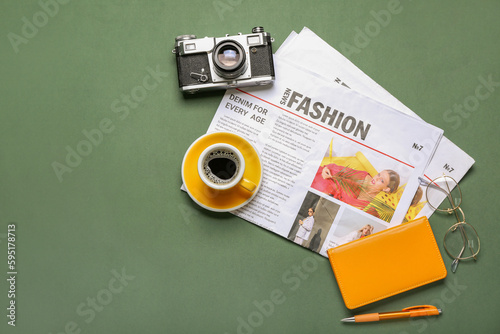 Newspapers with cup of coff...