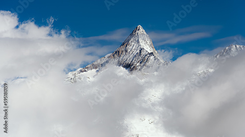 Triumphal über den Wolken: Das Finsteraarhorn von der Südseite photo