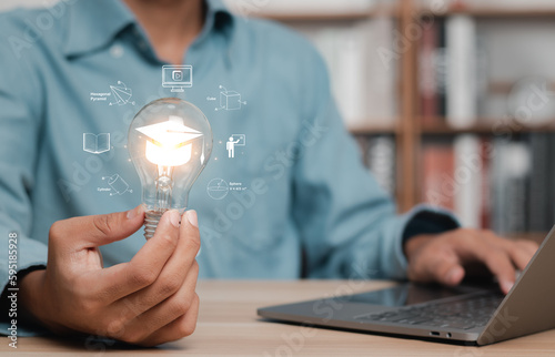 Glowing bulb with graduation cap and futuristic icon. Self-learning or knowledge of education and business studies in learning online classes or e-learning at home.