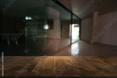 Empty wooden table in front of abstract blurred background of restaurant . can be used for display or montage your products.Mock up for display of counter.