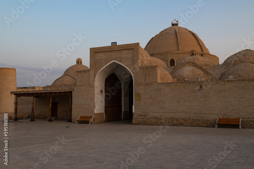 Early morning near the medieval bazaar Toki Zargaron. Architecture of ancient Bukhara. Uzbekistan.