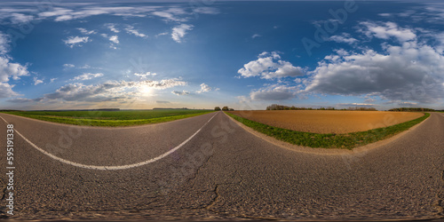 spherical 360 hdri panorama on old asphalt road with cracks with clouds and sun on evening blue sky in equirectangular seamless projection  as sky replacement in drone panoramas  game development